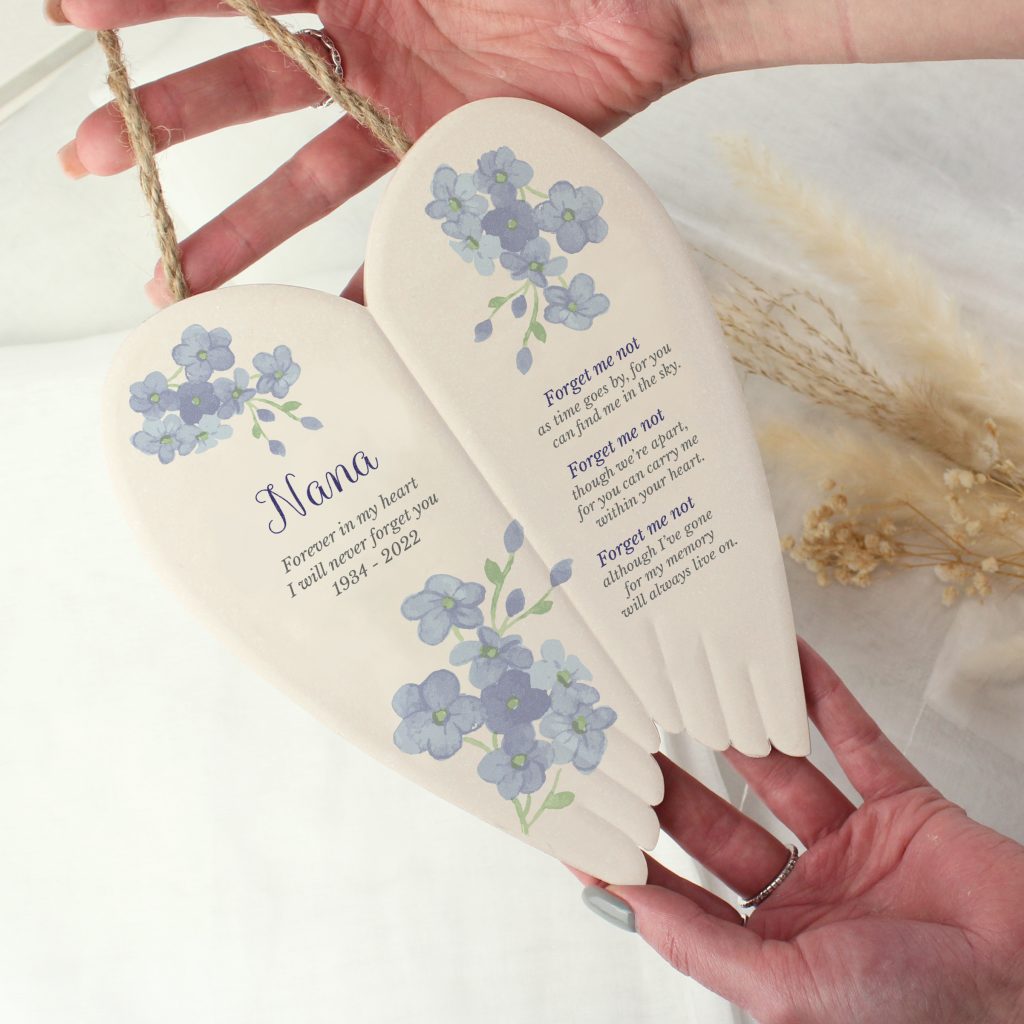 Personalised Forget me not Ceramic Wings Hanging Ornament