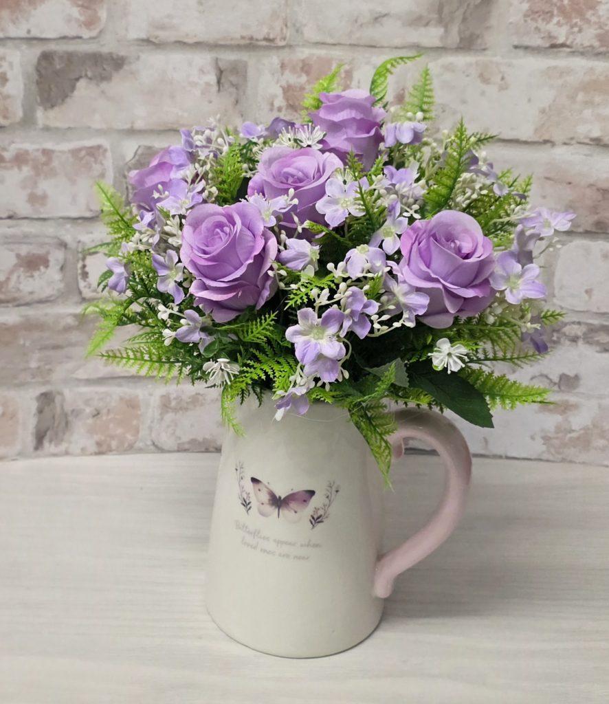 Artificial Flower Arrangement | Butterfly Jug with Lilac Roses