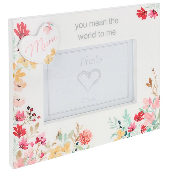 Celebrate the love of a Mum with this beautiful Mum photo frame complete with a stunning floral print. Designed to hold a 6x4 inch photo (10x15cm) this elegant freestanding frame makes a meaningful keepsake for Mothers Day, Birthdays, or as a loving remembrance tribute. Whether you're celebrating a Mum who is by your side or remembering one who is deeply missed, this frame creates a lasting tribute filled with love. Browse more of our silk flowers online, we create a wide range of designs and colours. Additionally if you're local to the Wirral, we have a beautiful shop you can visit. Keep up to date with us on our Sianees Flowers Facebook page.